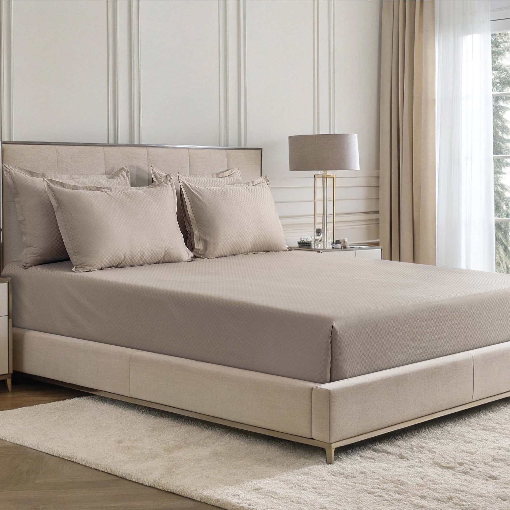 Alhambra clay brown 300 thread count cotton jacquard sateen sheet set on a bed